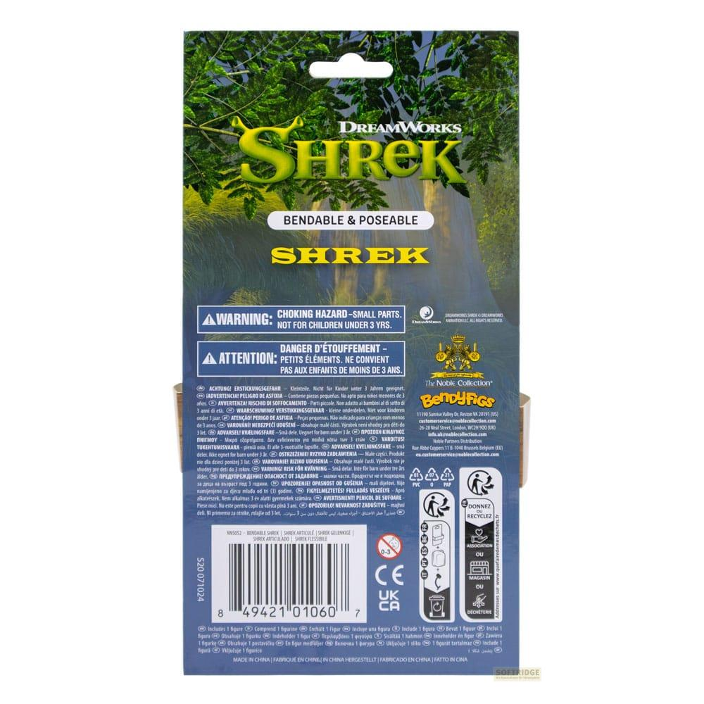Embalaje de figura de acción de Shrek con advertencias e información del fabricante.
