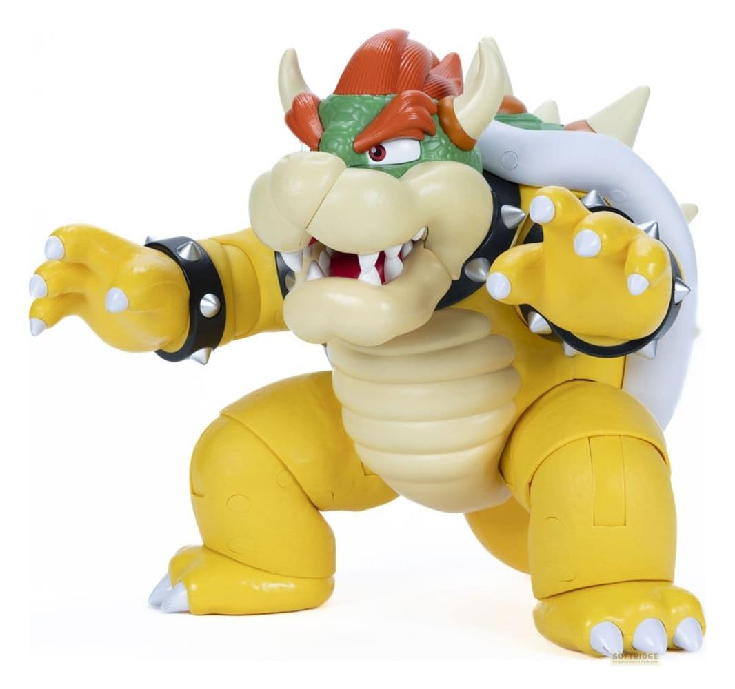 Bowser-Spielzeug: grüner Kopf, gelber Körper, stachelige Schale, rote Haare, spitze Zähne.