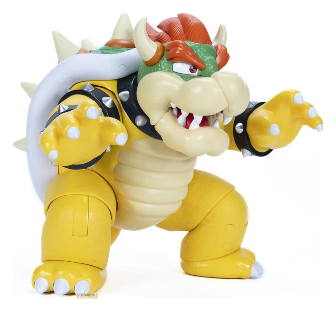 Bowser-Figur mit gelben Armen und Beinen, grünen Stacheln und rotem Haar.