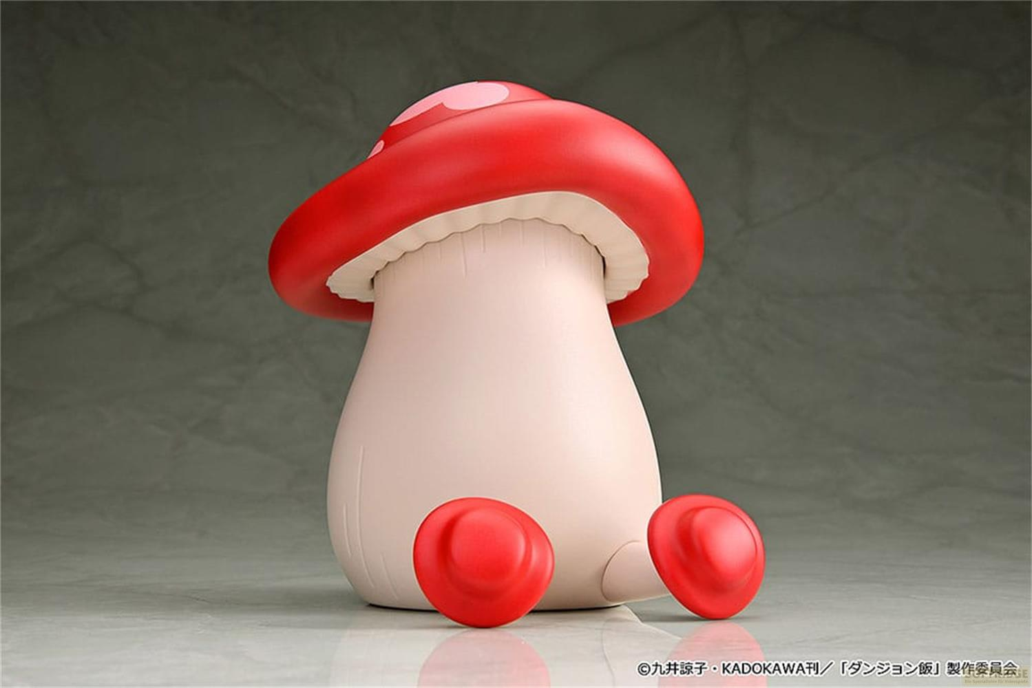 Figura di fungo rossa e bianca con piedi rossi su sfondo grigio.