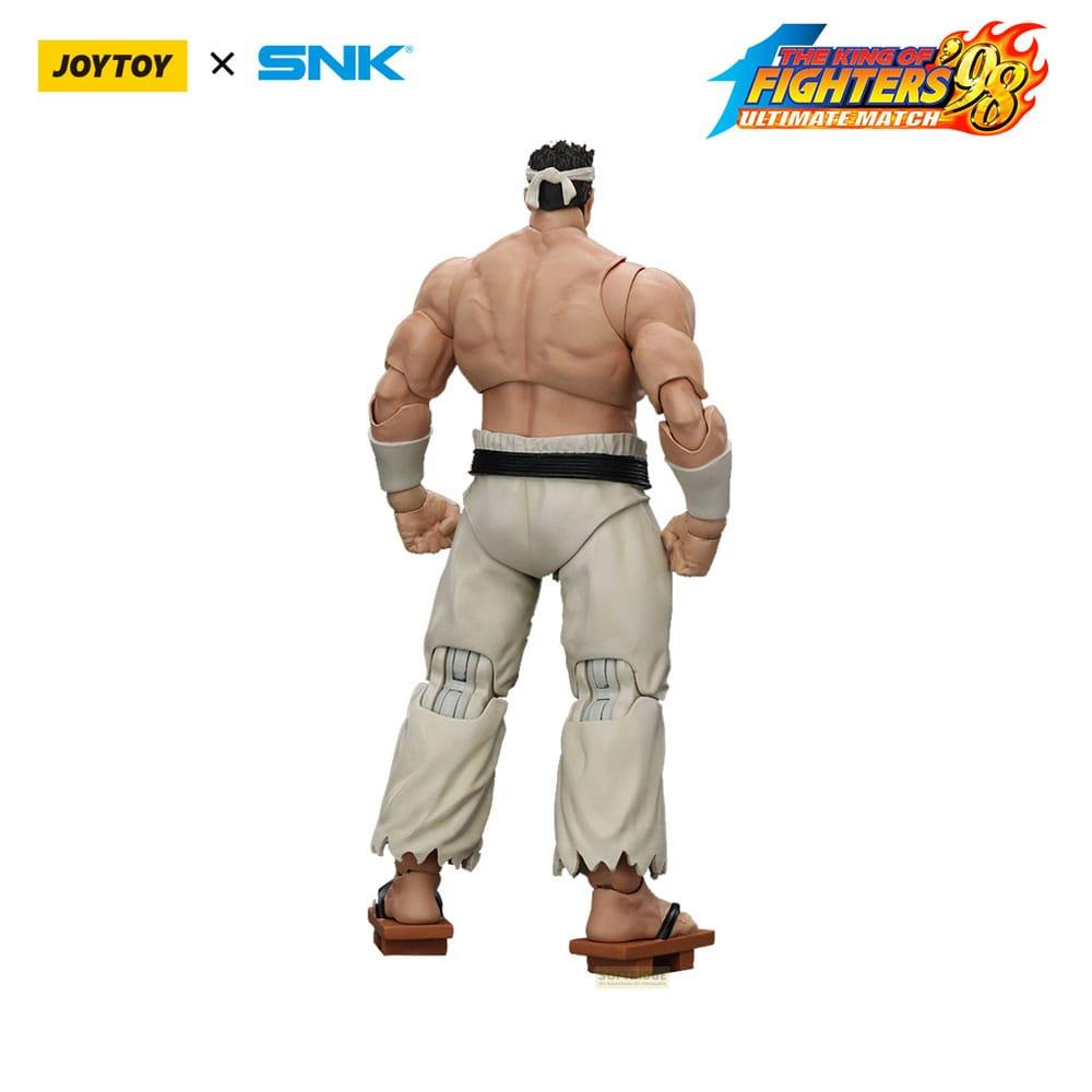 Modello action figure di un uomo muscoloso con pantaloni kaki e sandali.