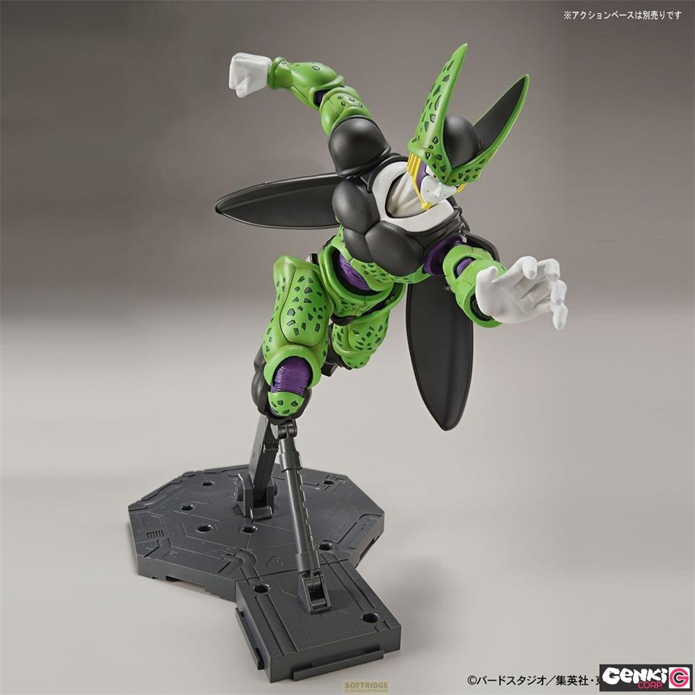 Une figurine verte tachetée de noir sur un socle gris.