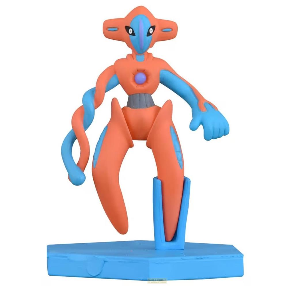 Orange und blaue Figur mit Armen, Beinen und Kopf, steht auf blauem Sockel.