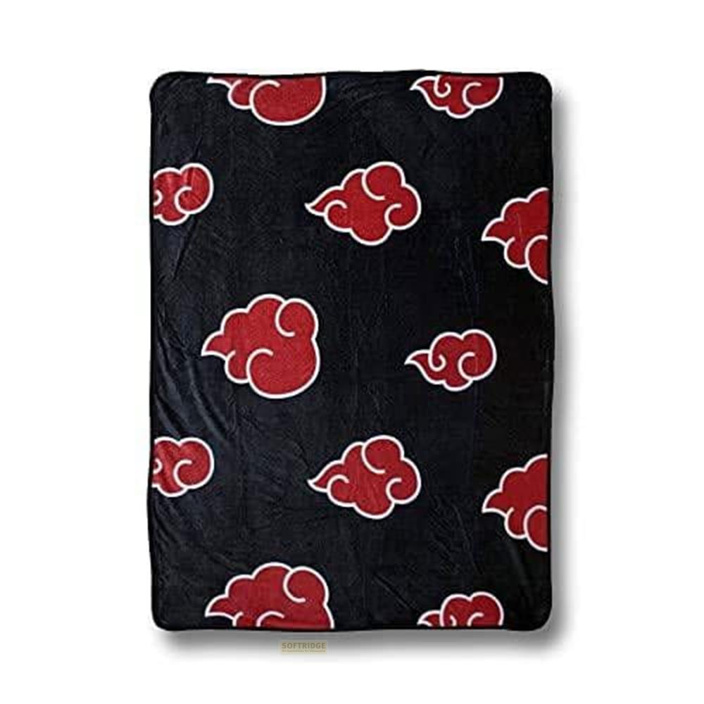 Schwarze Decke mit roten Wolkenmuster und weißer Umrandung.