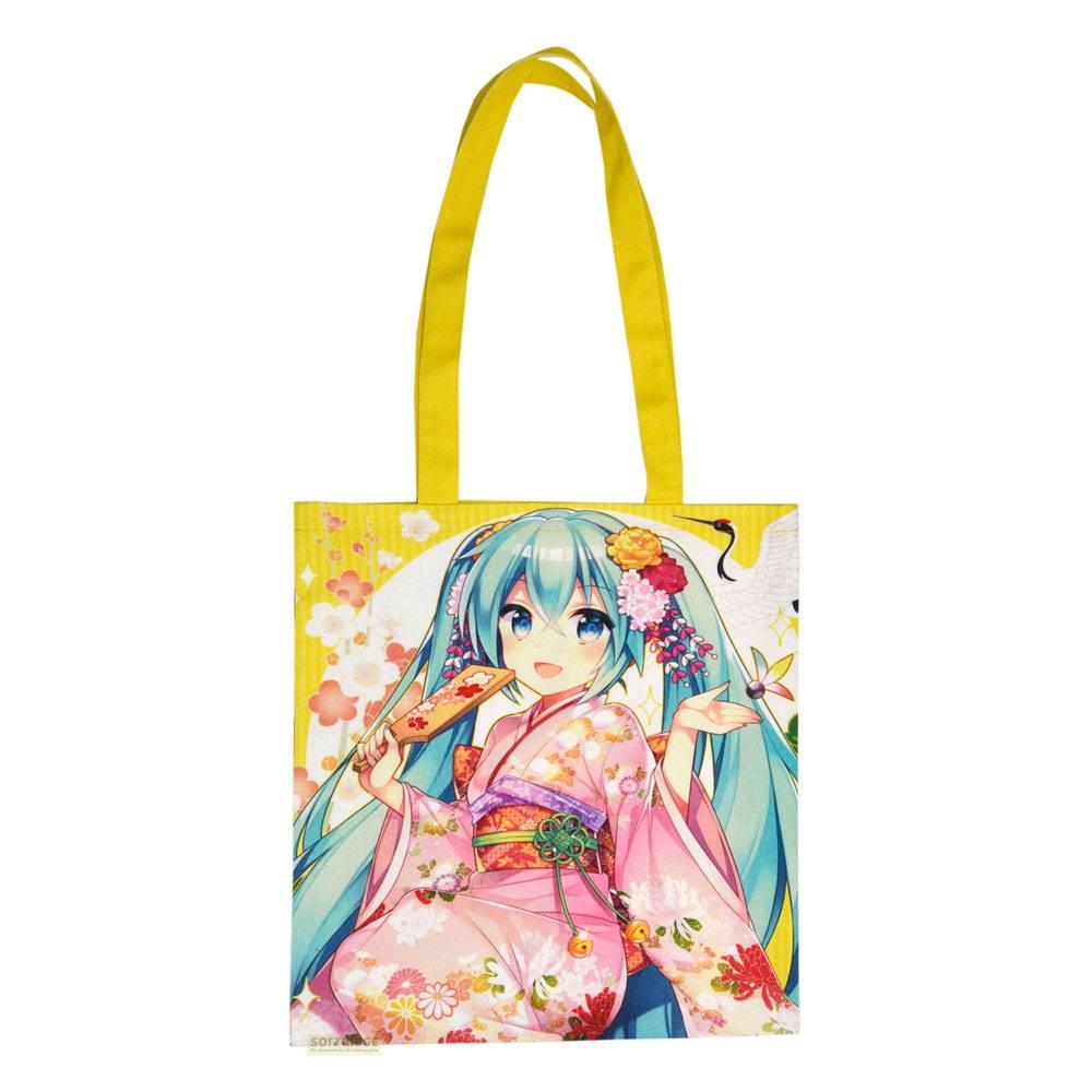 Eine Einkaufstasche mit Anime-Mädchen im Kimono und gelben Henkeln.