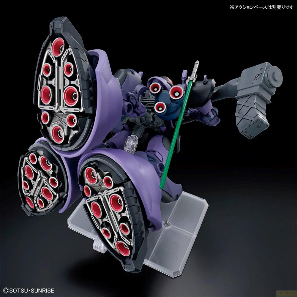 Un modèle de robot violet avec de grands propulseurs et une arme verte se tient sur un socle transparent.