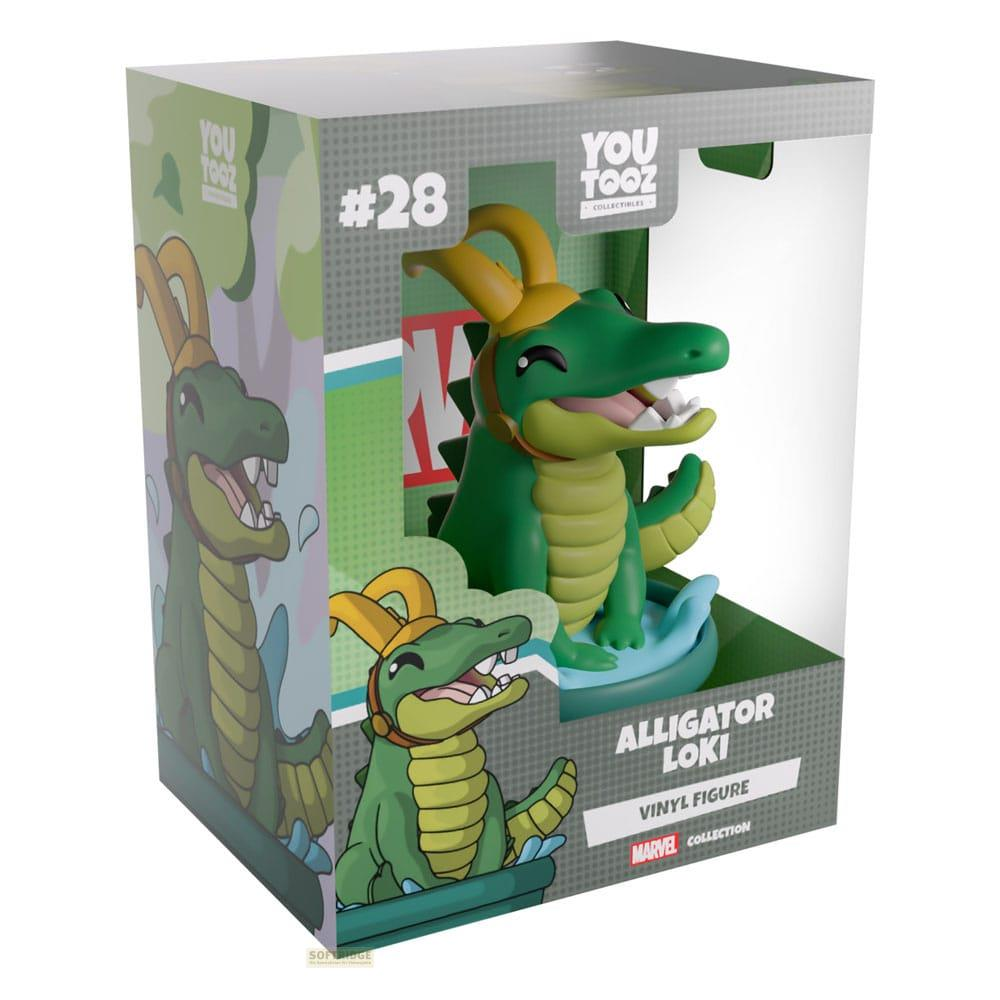 Grüne Krokodilfigur mit gelbem Helm in einer Box. #28 Alligator Loki.
