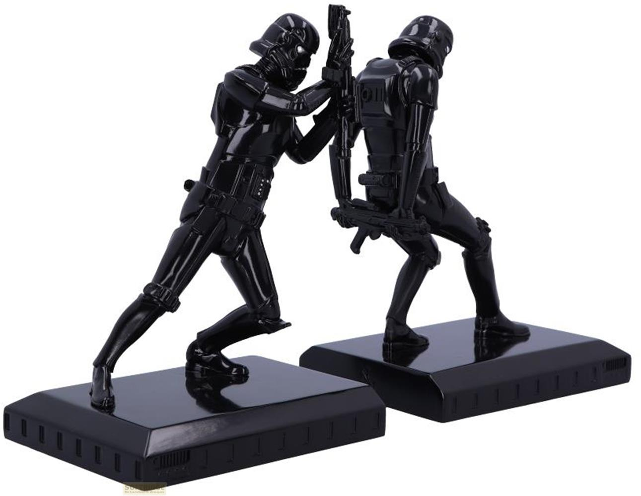 Zwei schwarze Star Wars Figuren mit Gewehren auf schwarzen Podesten.