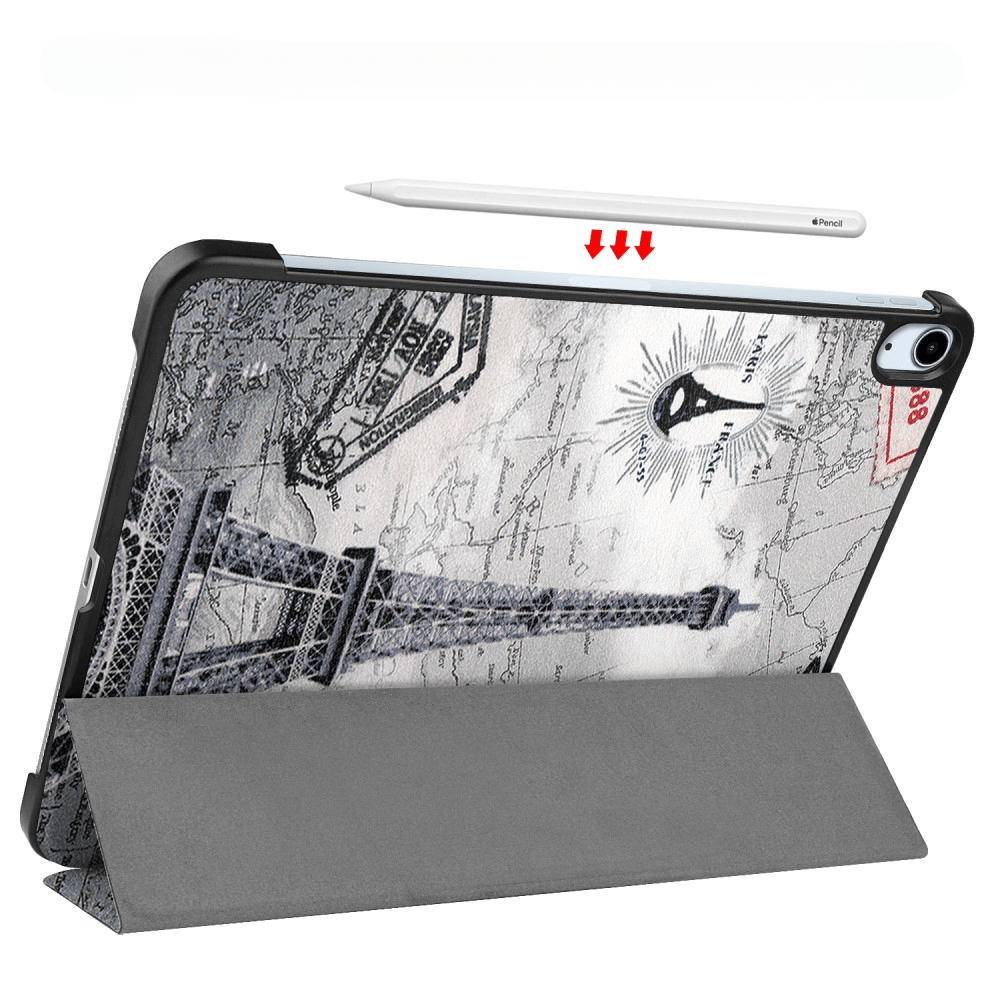 Une tablette dans un étui style vintage avec la Tour Eiffel. Un stylet est positionné au-dessus.