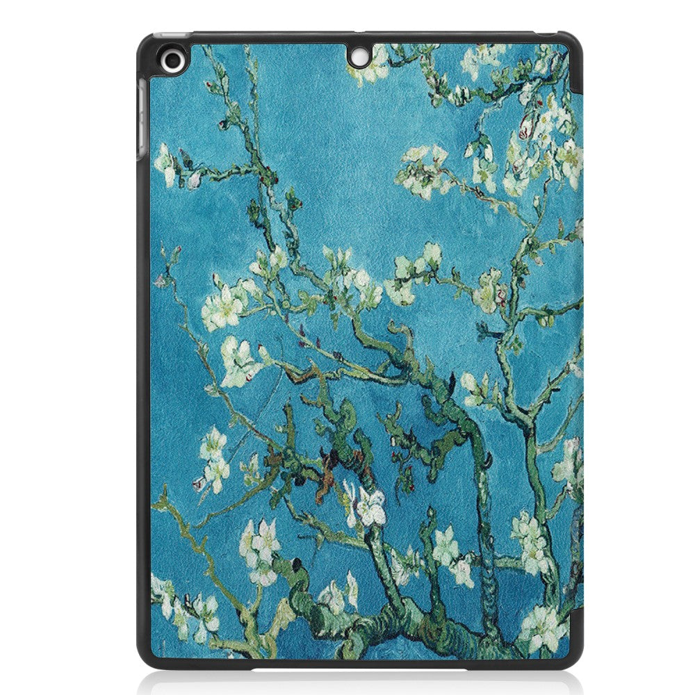 Ein Tablet mit Van Goghs Mandelblüte auf blauem Hintergrund.