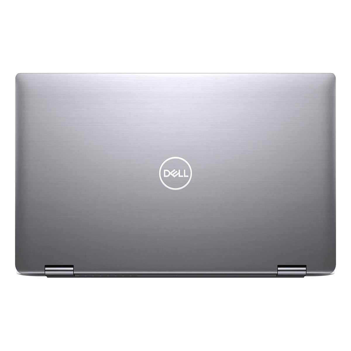 Zamknięty srebrny laptop Dell z logo Dell pośrodku.