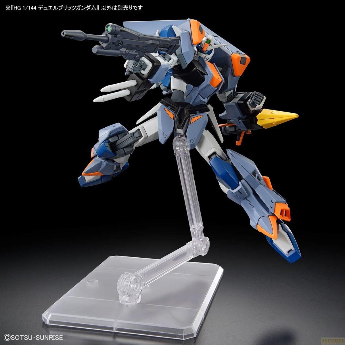 Ein blauer und grauer Mech mit orangefarbenen Akzenten, der eine Waffe hält.