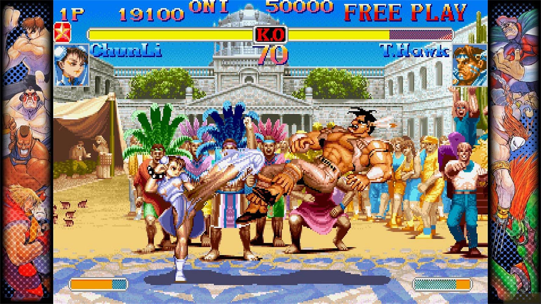 Chun-Li donne un coup de pied à T. Hawk dans un jeu de combat.