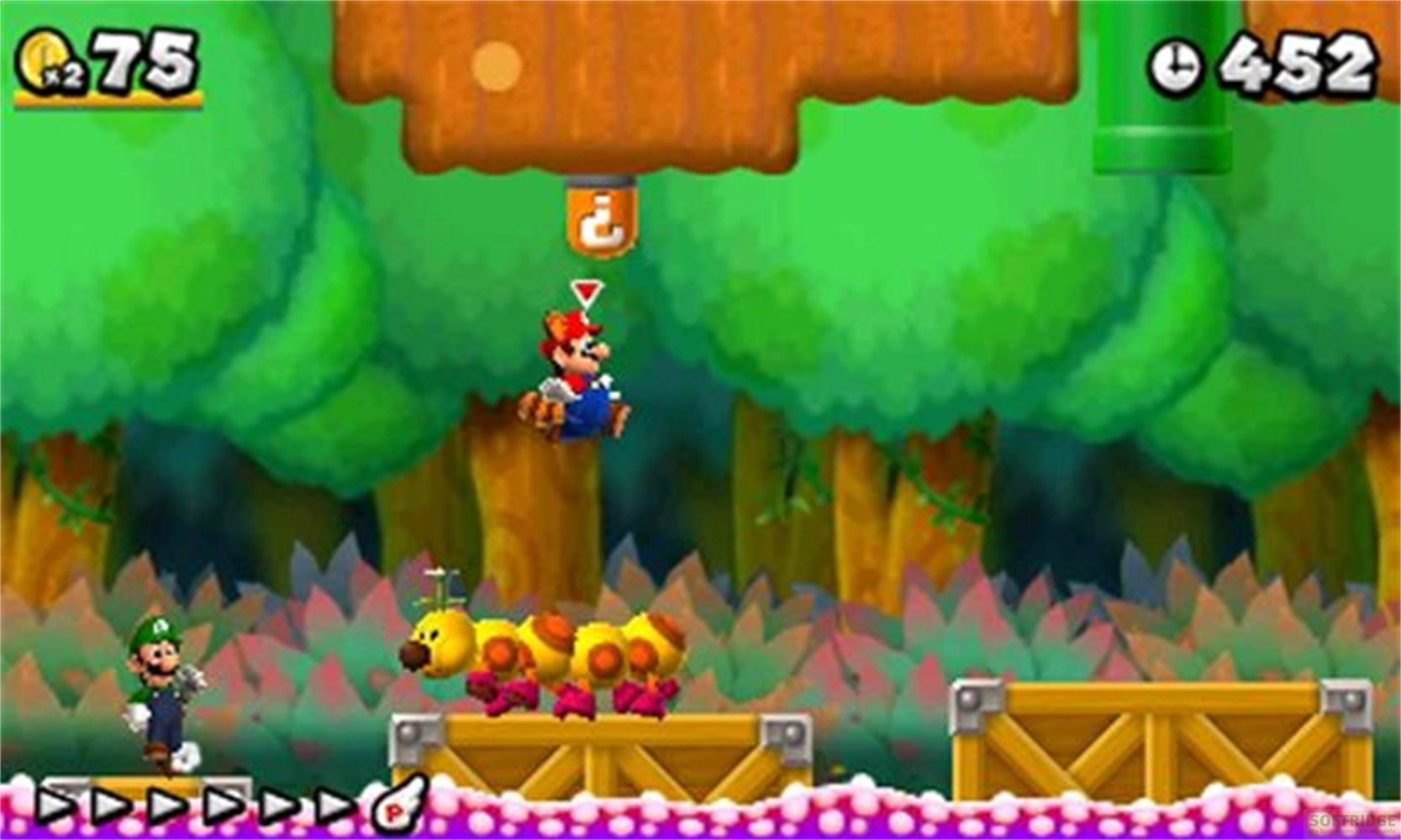 Luigi und Mario springen in einem Wald auf einer Raupe.