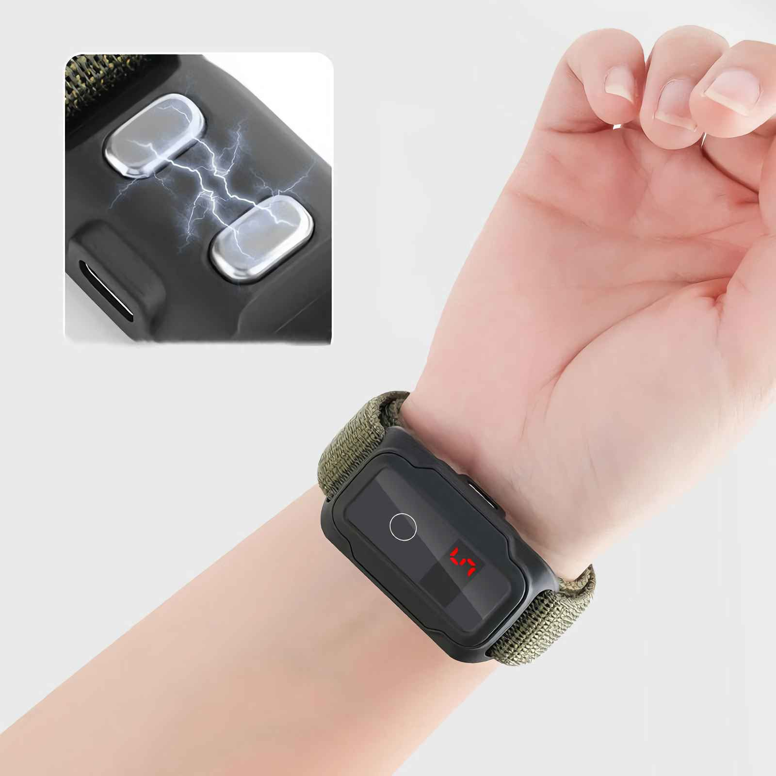 Ein Armbanduhr-ähnliches Gerät mit schwarzem Gehäuse und grünem Band am Handgelenk.
