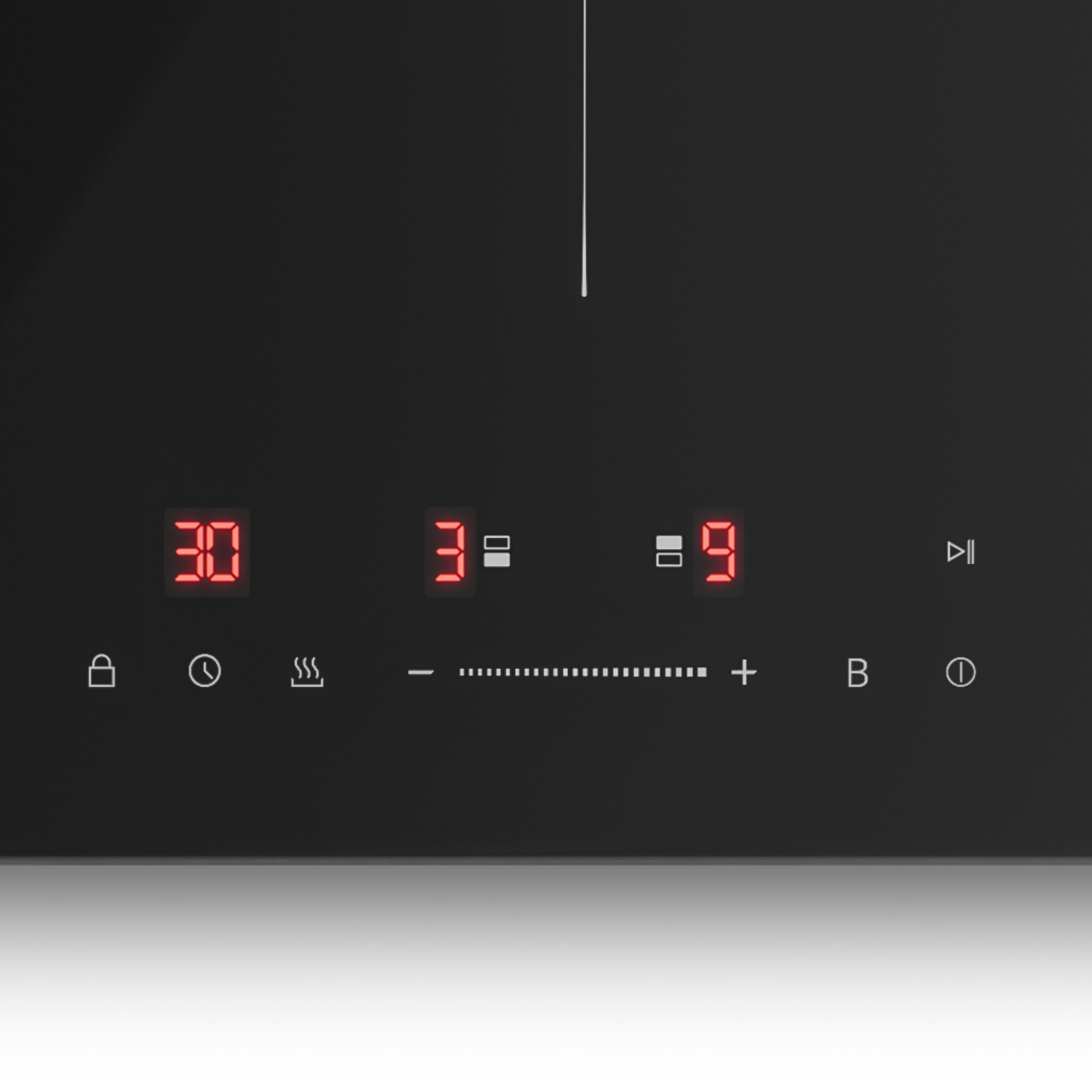 Eine schwarze Kochplatte mit roten digitalen Anzeigen für Zeit, Leistung und Timer.