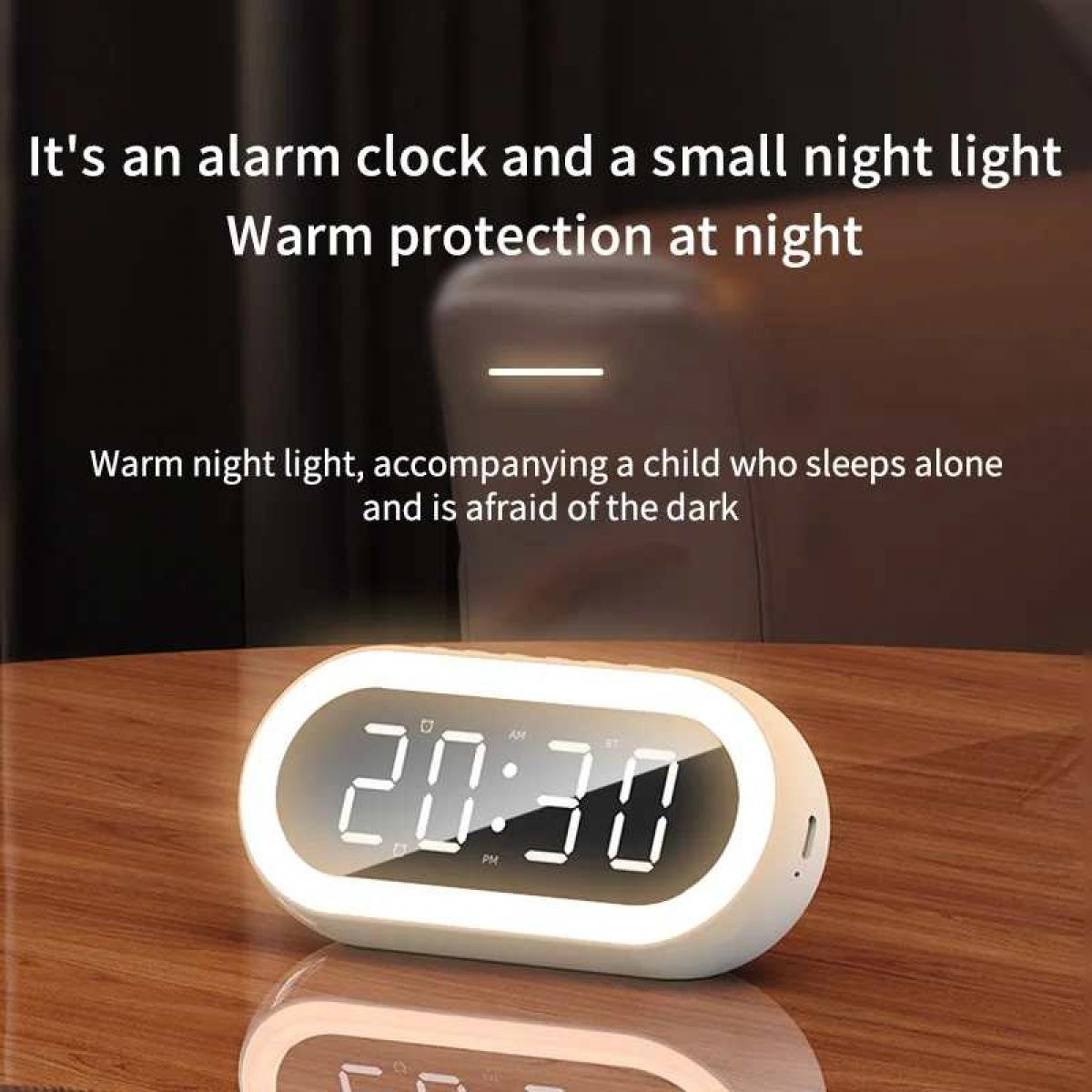 Ein digitaler Wecker mit Nachttischlampe zeigt 20:30 an.