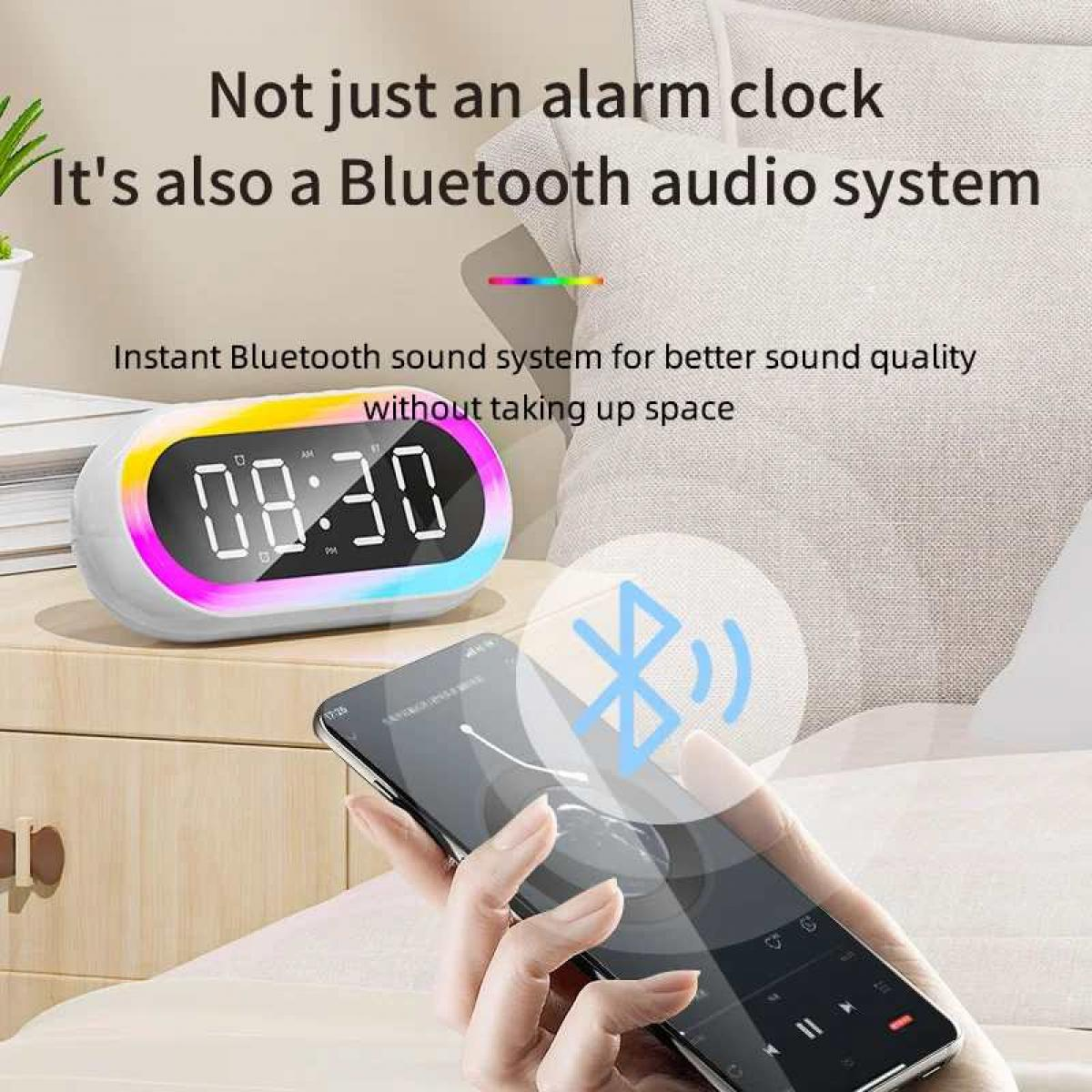 Ein moderner Wecker mit farbiger Beleuchtung und einem Smartphone, das Bluetooth verbindet.