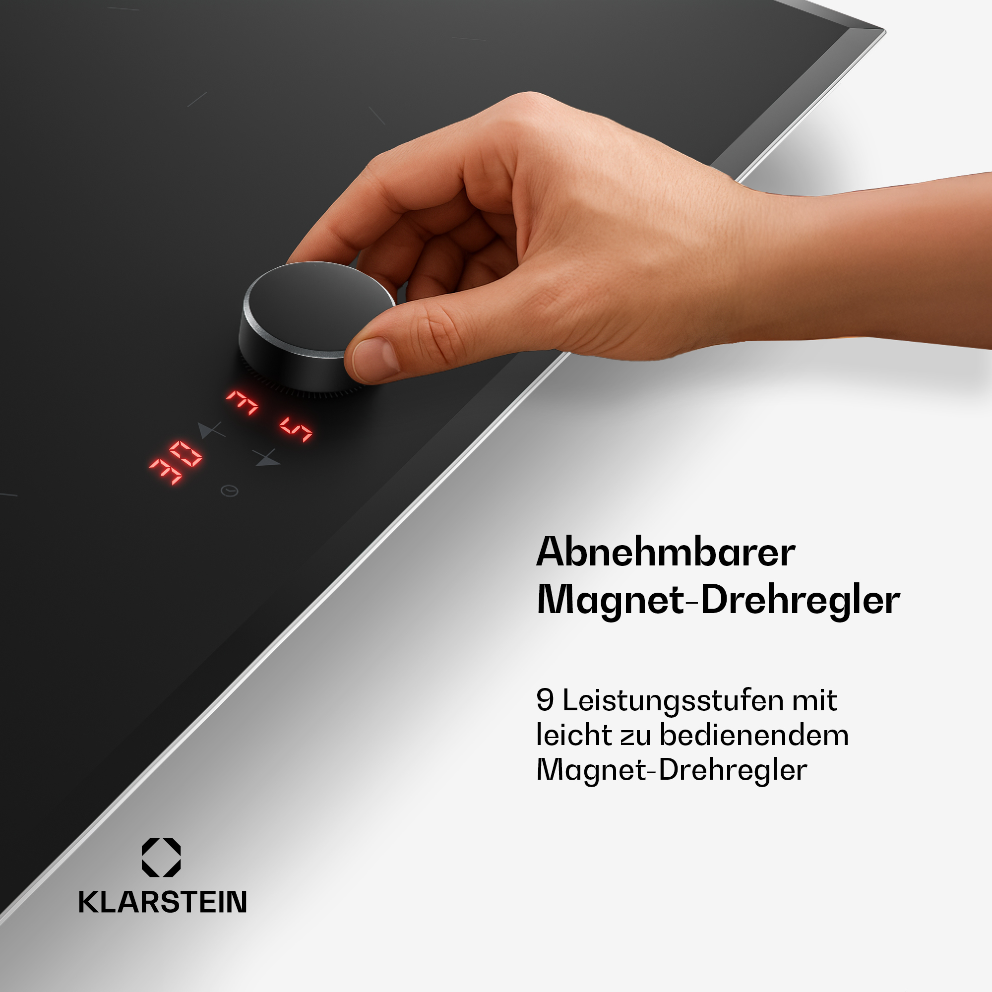 Hand dreht schwarzen Magnet-Drehregler auf Kochfeld mit roter Digitalanzeige.