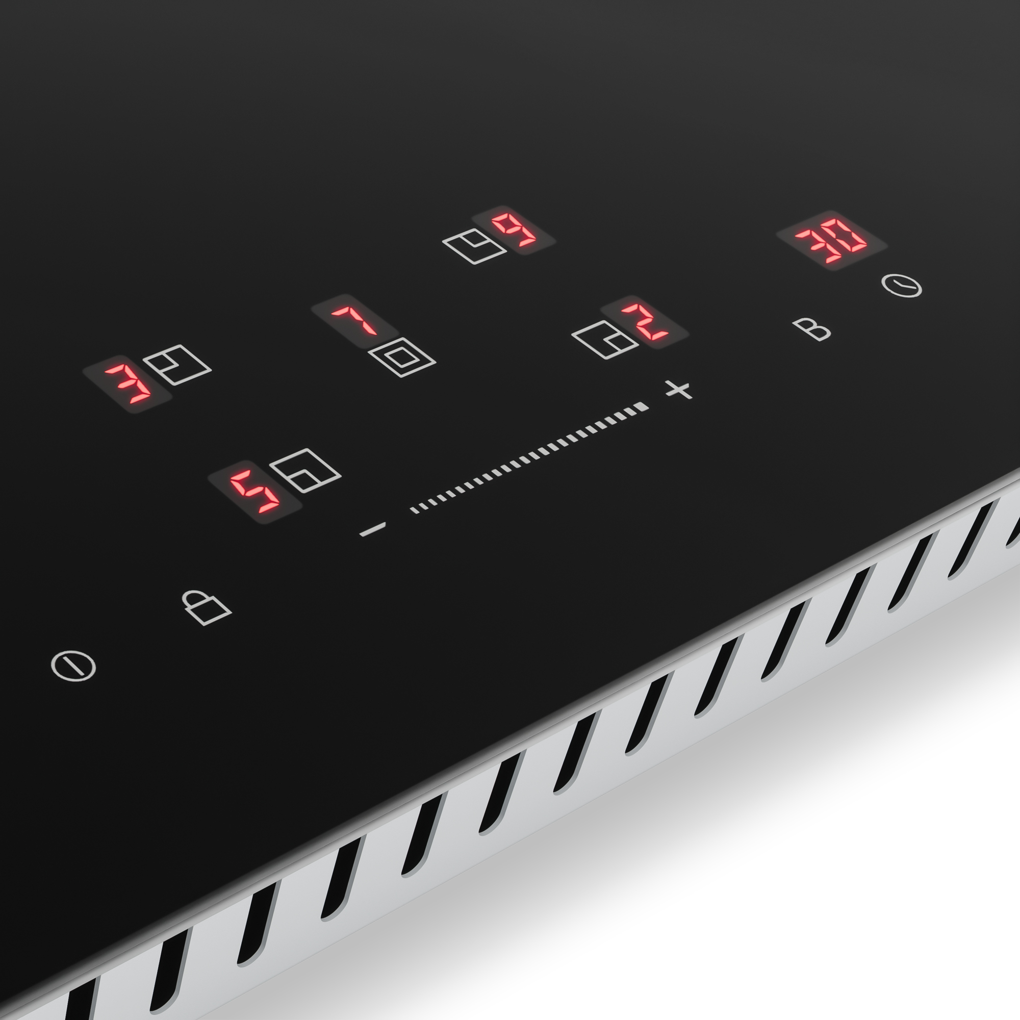 Ein schwarzes Kochfeld mit roten digitalen Anzeigen für Temperatur und Timer.