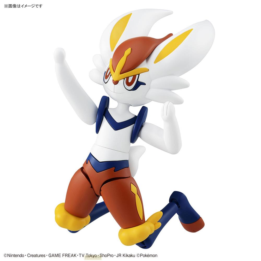 Une figurine blanche aux accents marron et bleu s'agenouille sur fond blanc.