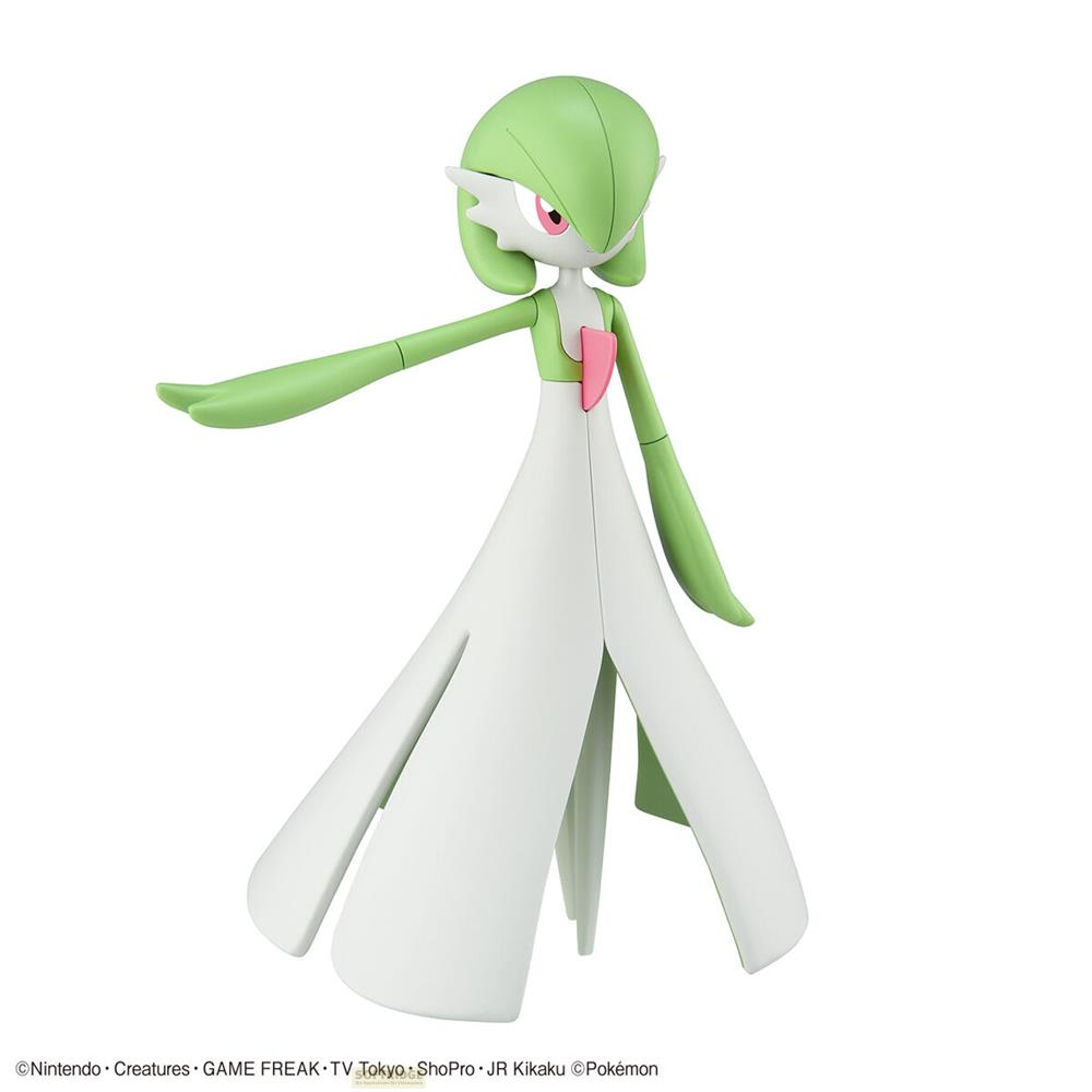 Une figurine Gardevoir verte et blanche, bras tendus, sur fond blanc.