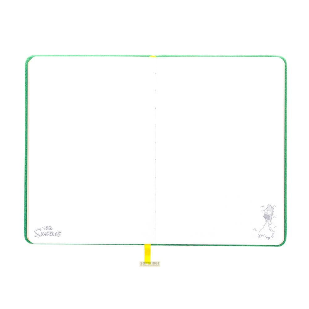 Un cuaderno abierto con bordes verdes y el logo de Los Simpsons.