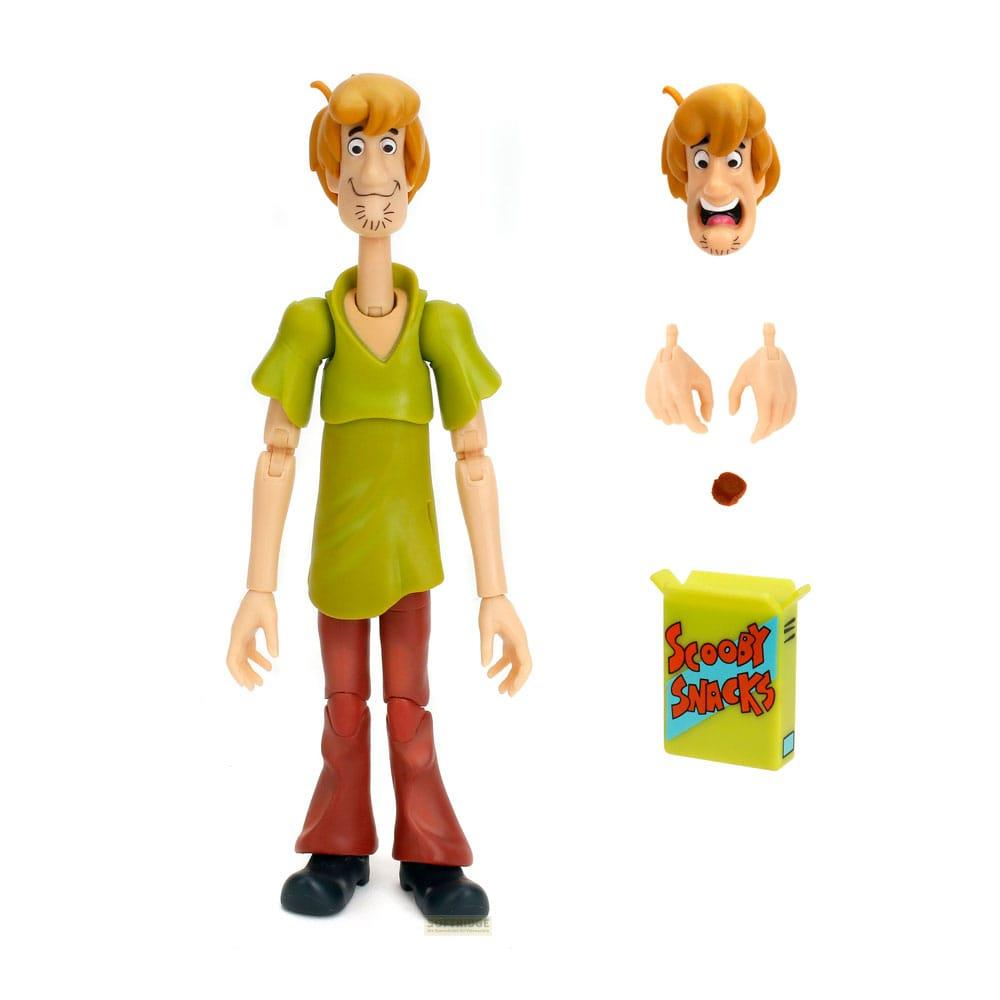Una action figure di Shaggy con camicia verde, pantaloni rossi e accessori.