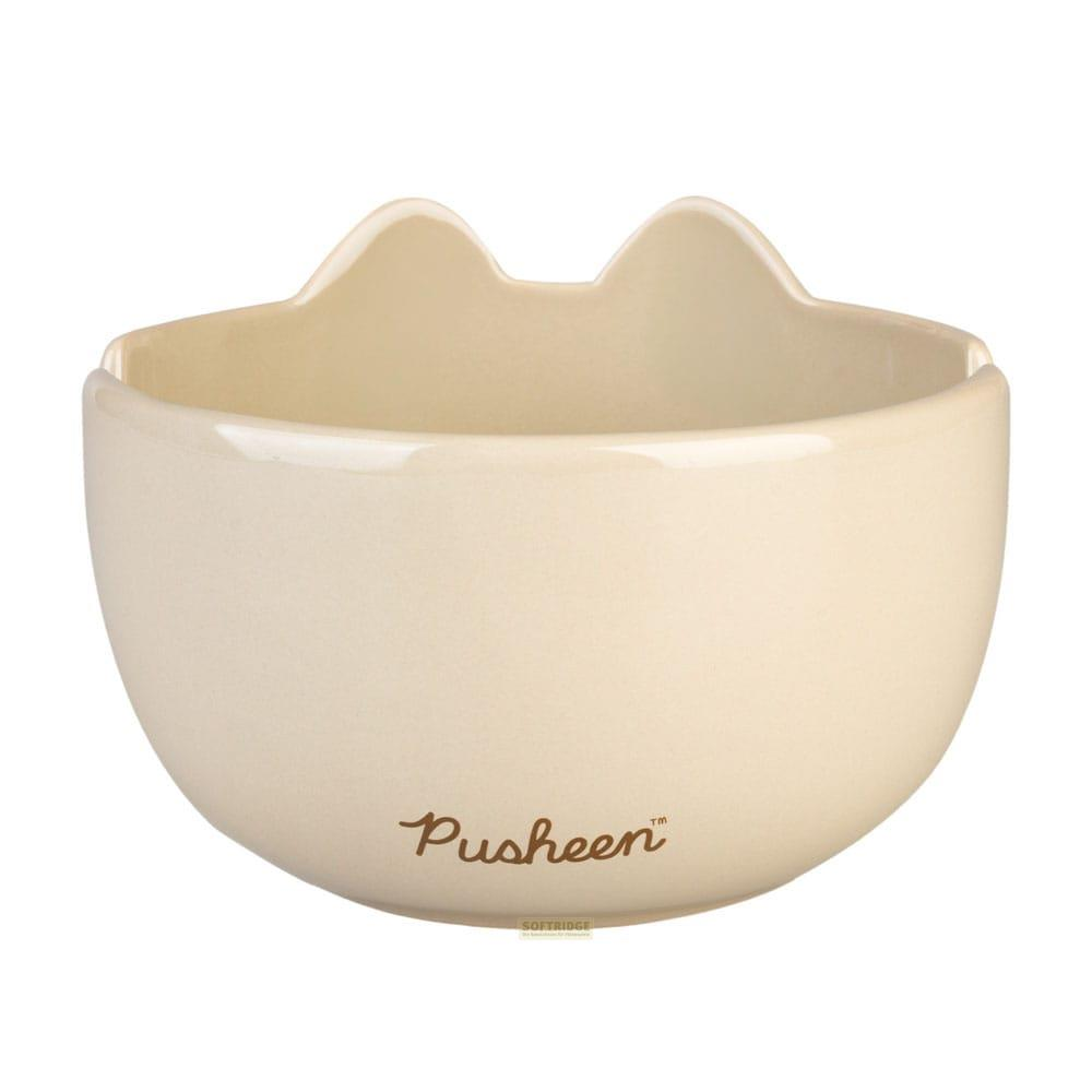 Un cuenco color crema con diseño de orejas de gato y logo de Pusheen.
