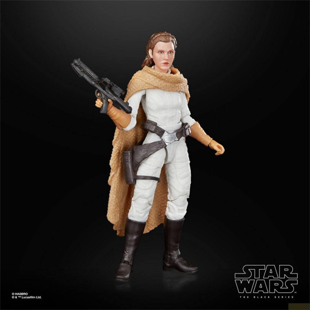 Figura de acción de la Princesa Leia con traje blanco, bufanda marrón y bláster.