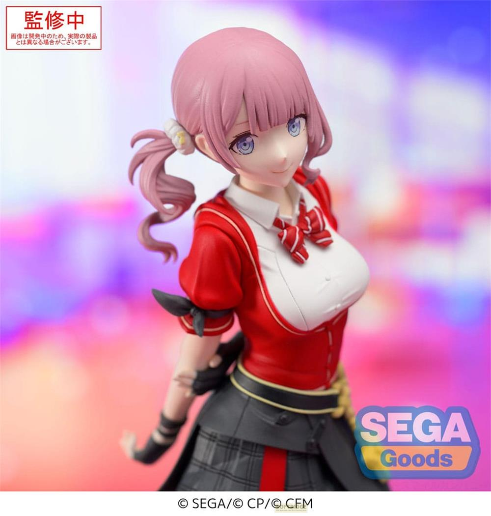Eine Figur mit rosa Haaren im Schulmädchen-Outfit mit roter Jacke.