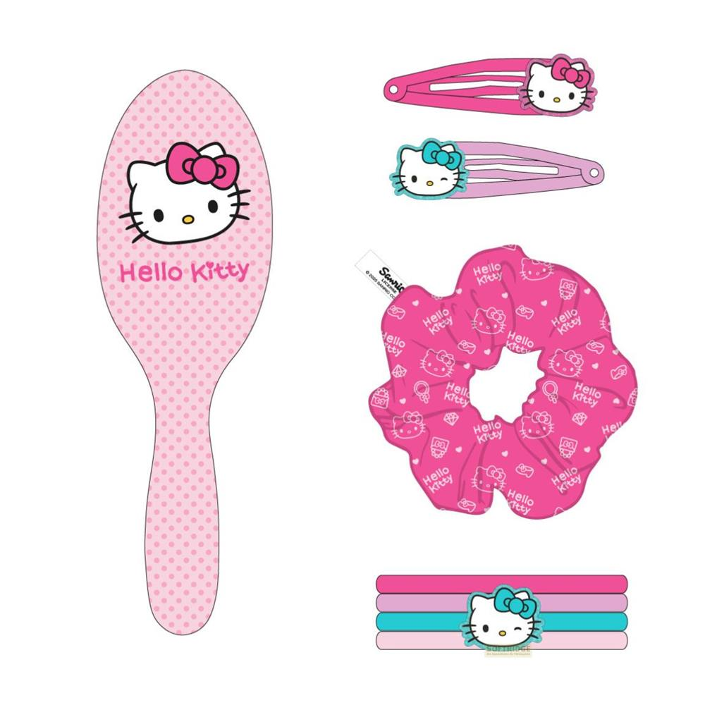 Ein rosa Kamm und Haarschmuck mit Hello Kitty Motiv.