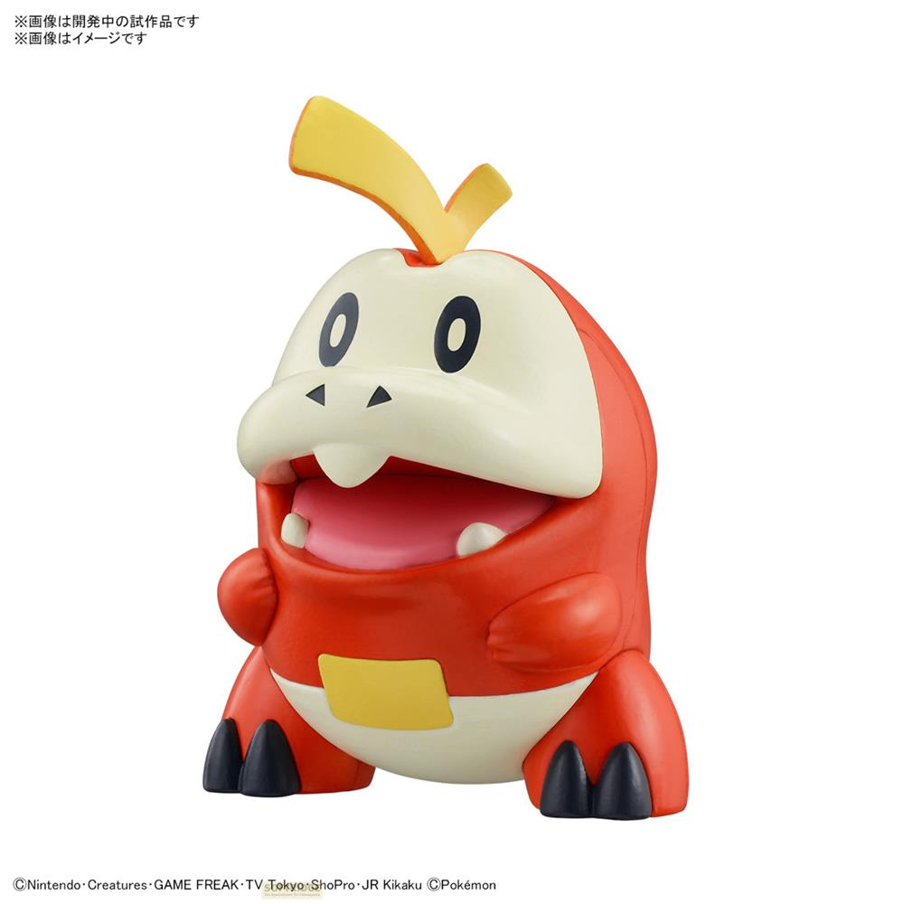 Eine rote Pokémon-Figur mit gelbem Haar, offenen Mund und schwarzen Füßen.