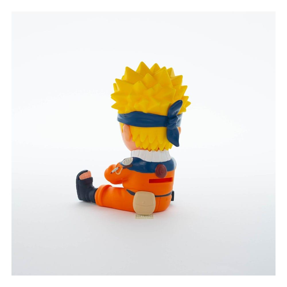 Una pequeña figura de Naruto se sienta en el suelo. Viste un traje naranja.