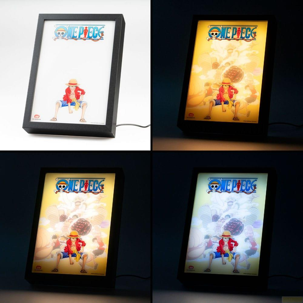 Un marco iluminado con un póster de One Piece con Luffy en el centro.