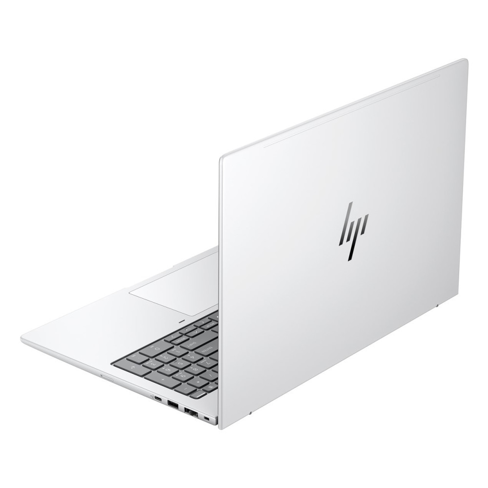 Un portátil plateado con un logo negro de HP en la tapa.