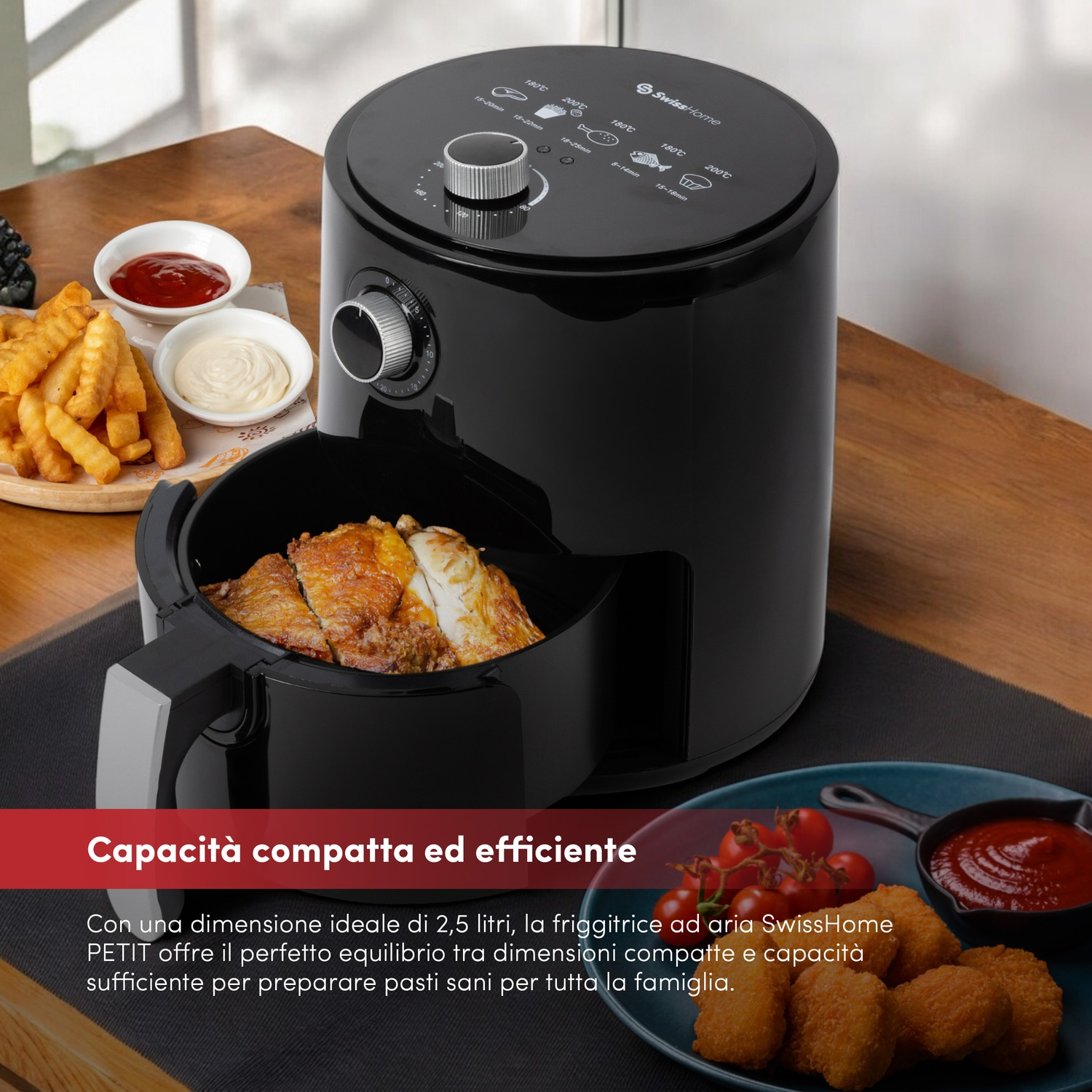 Friteuse ad aria nera con pollo, patatine, nuggets e pomodorini.