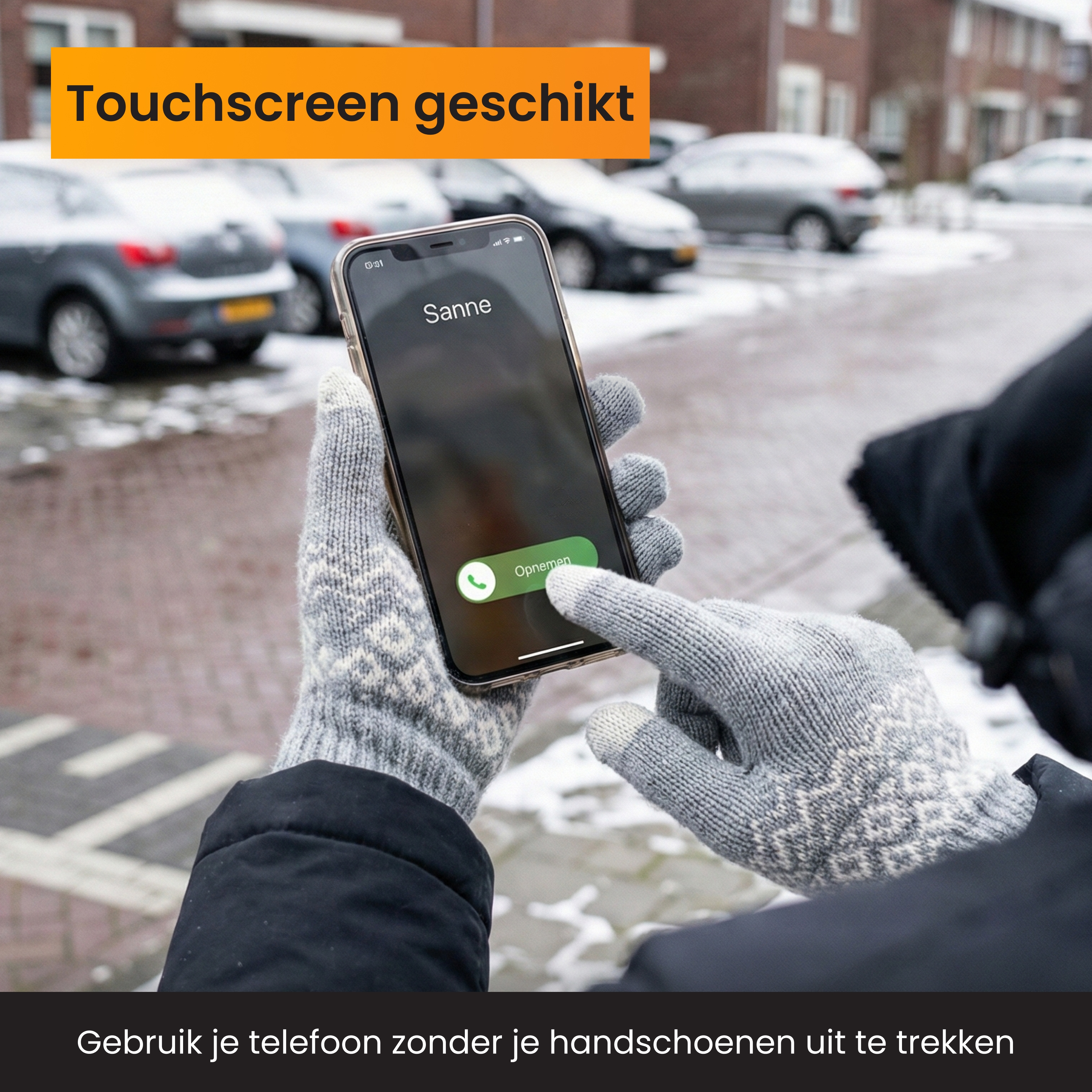 Person wearing gloves uses smartphone in snow. "Touchscreen suitable."