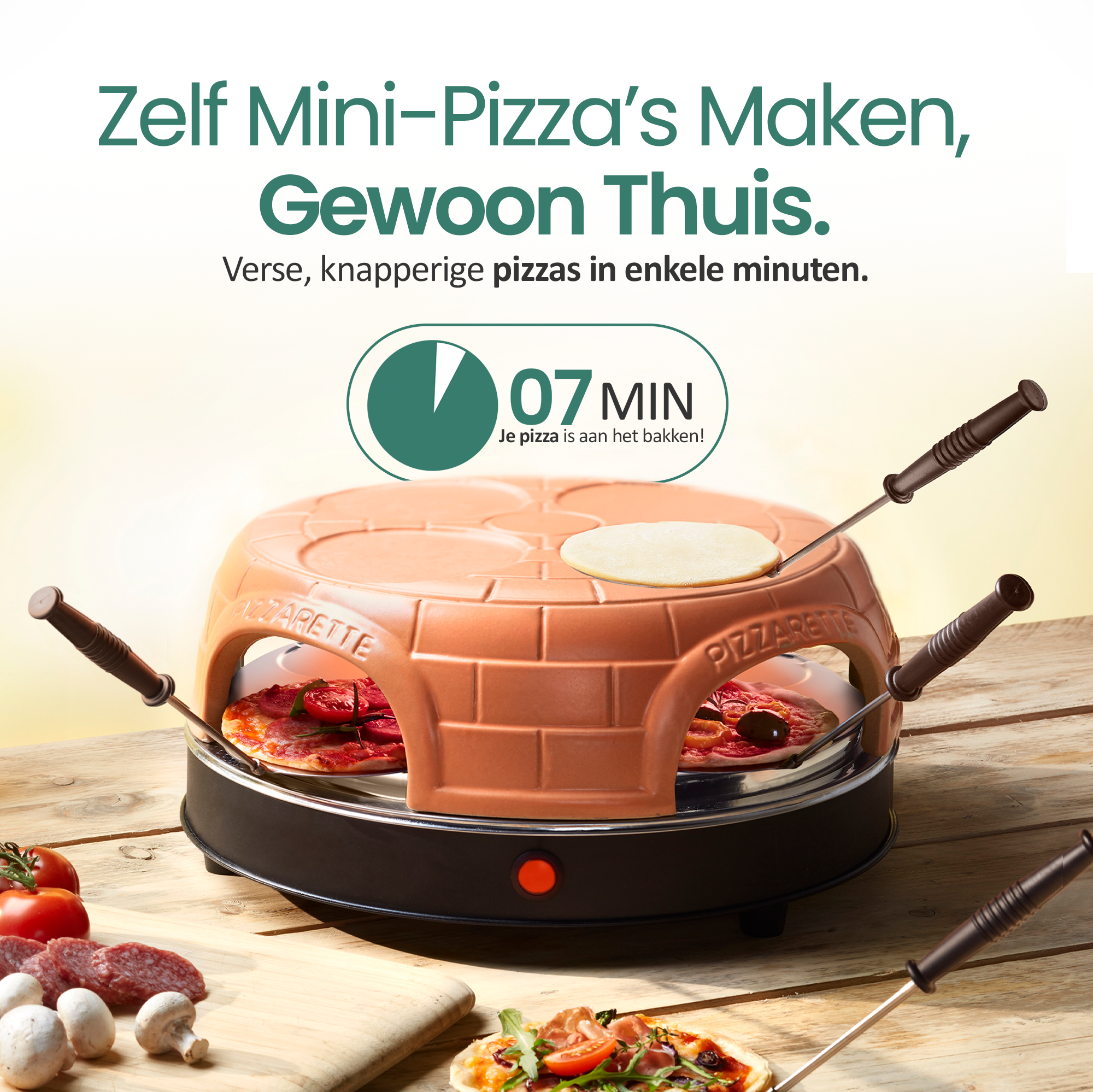 A terracotta pizza oven with four mini pizzas and ingredients nearby.