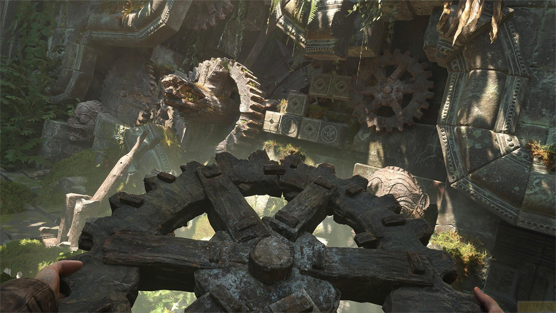 Ruines antiques avec engrenages et plantes. Une main est visible au premier plan.