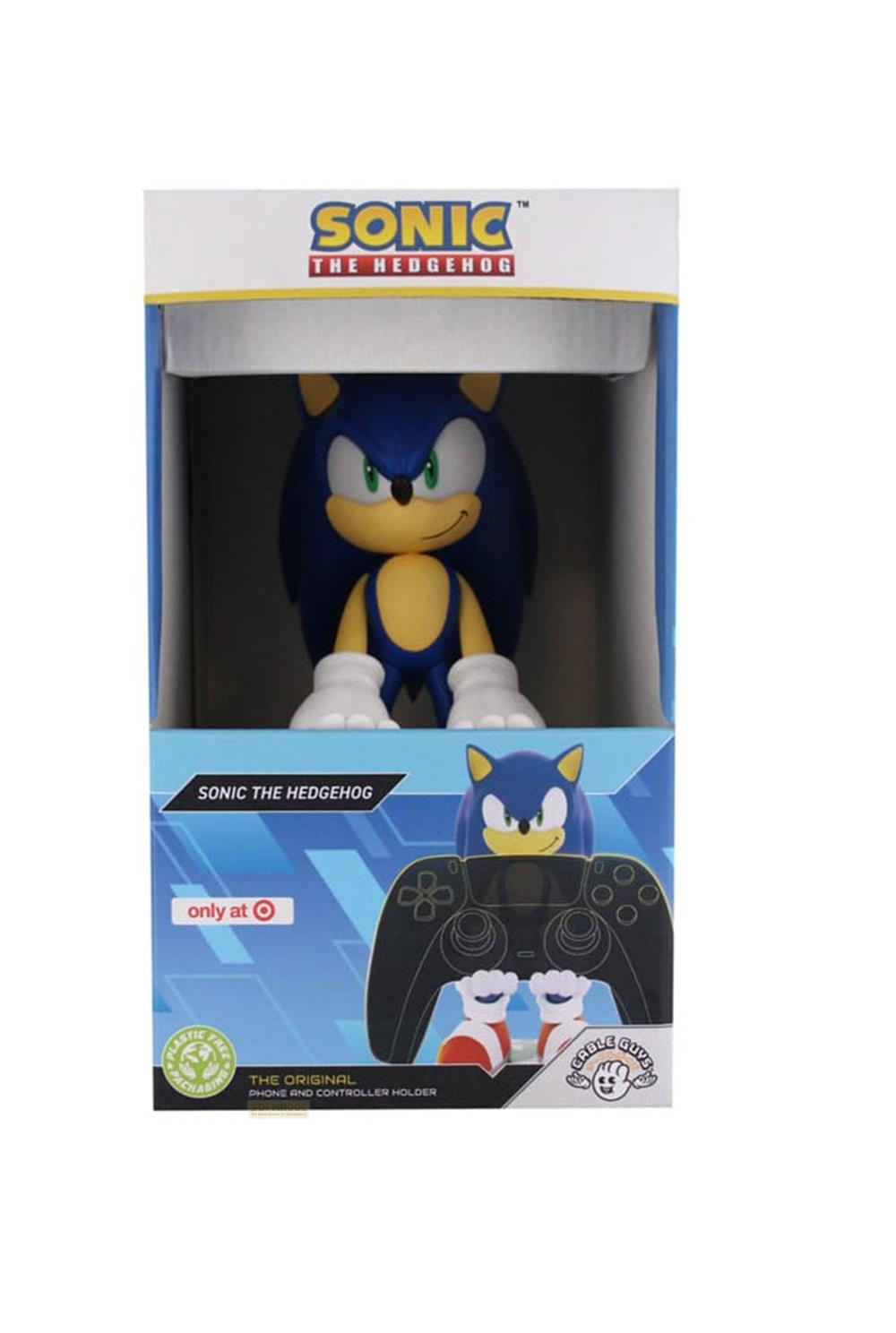 Figura di Sonic the Hedgehog in scatola con un porta controller nero accanto.