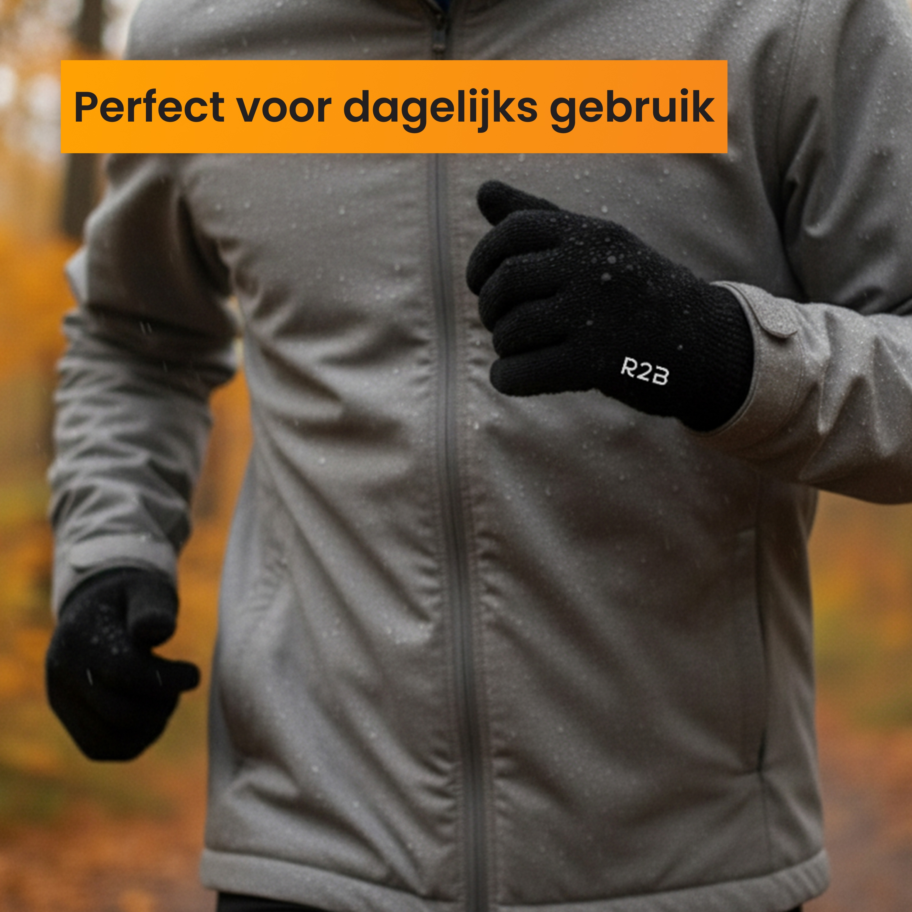 Man wearing black gloves and grey jacket, running outdoors.