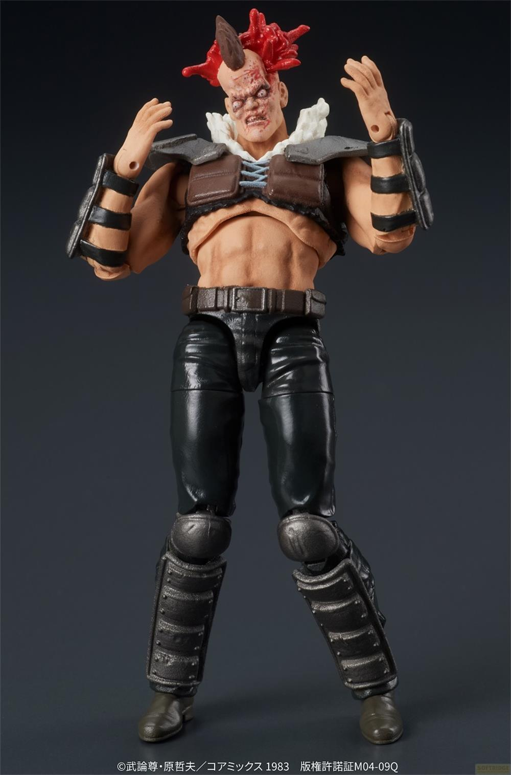 Action figure con capelli rossi e corno, indossa un gilet e pantaloni.