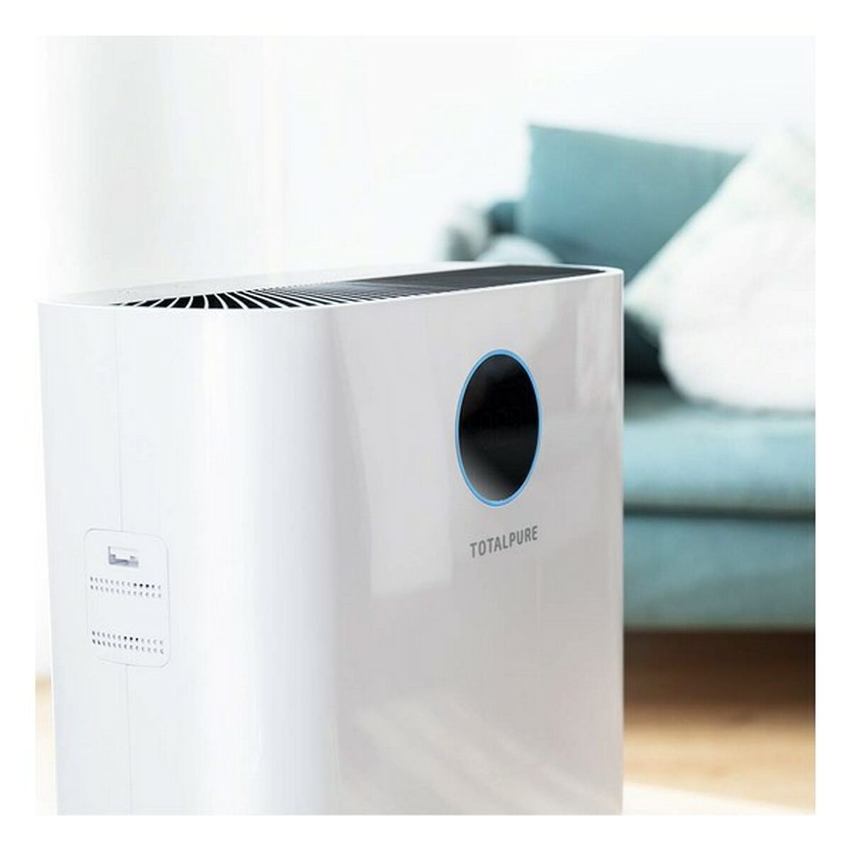 Un purificatore d'aria bianco con anello blu e testo TOTALPURE.