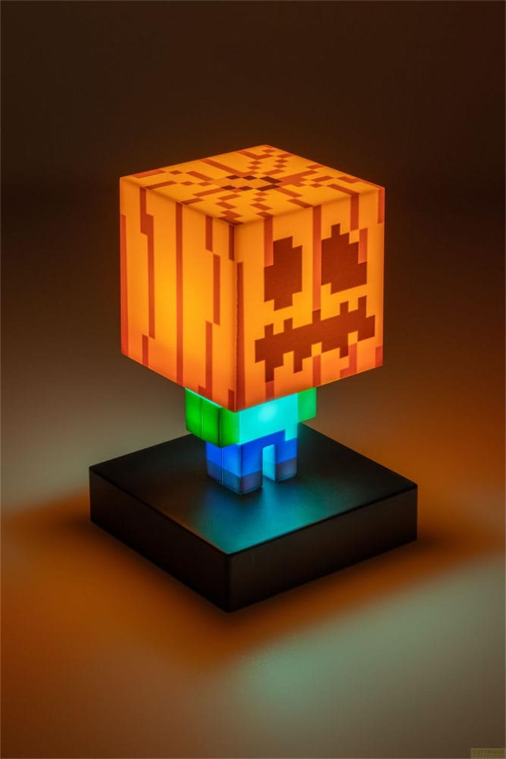 Lampa Minecraft Creeper z głową Jack-o'-lantern na czarnej podstawie.