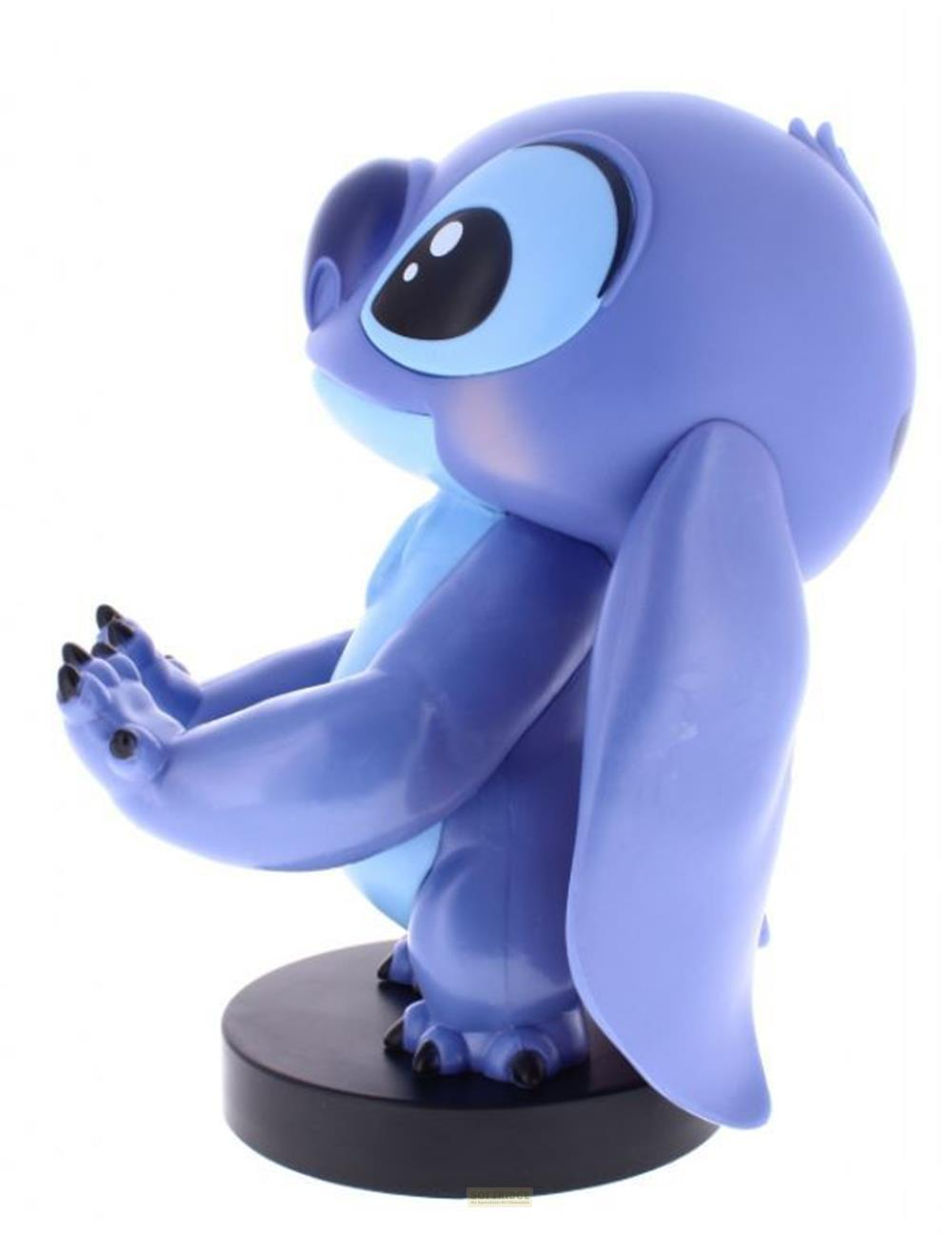 Una figura viola di Stitch con occhi grandi, su una base nera.
