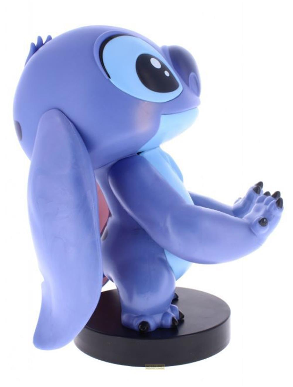 Statua viola di Stitch con grandi occhi blu, su base nera.