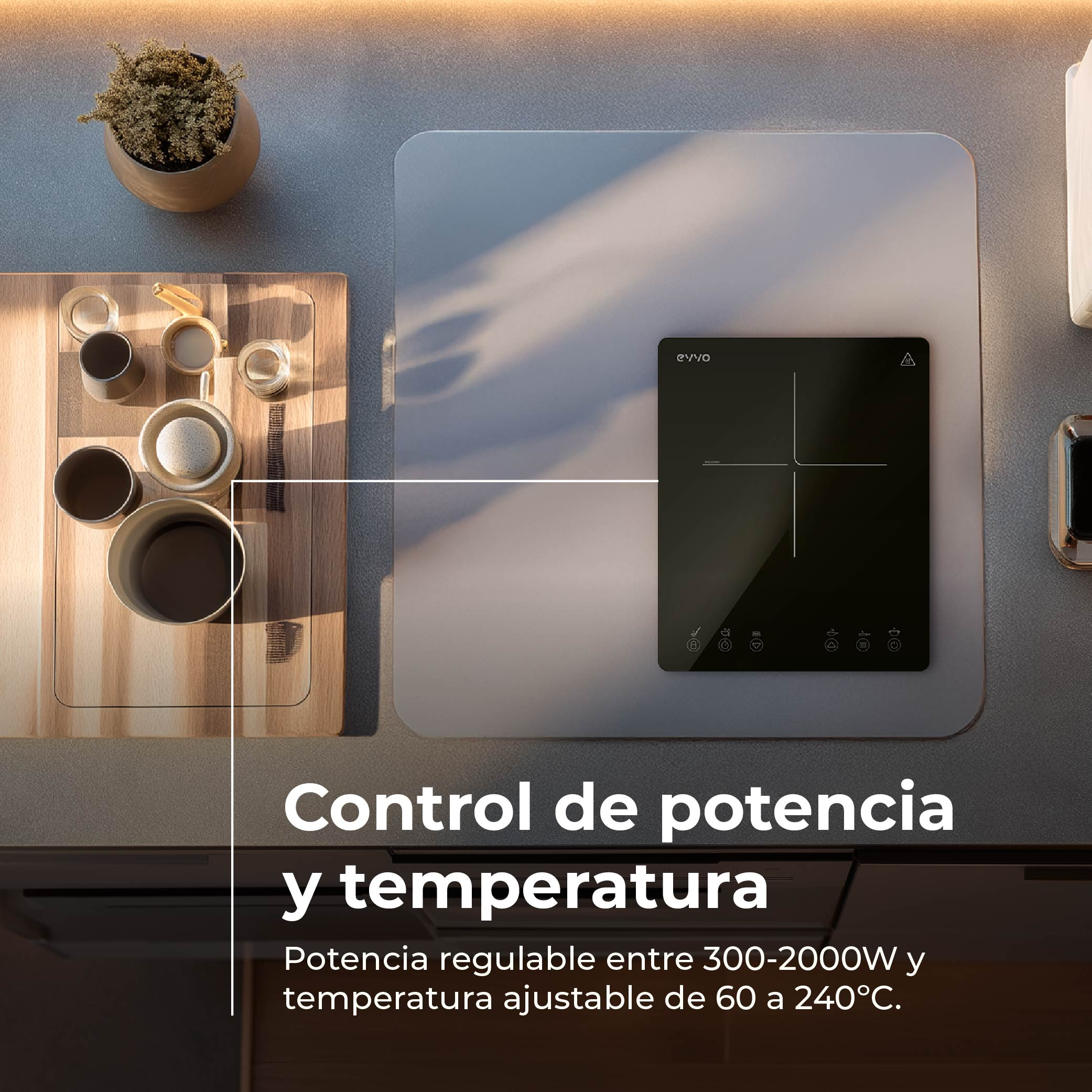 Piano cottura a induzione nero con pannello touch su un piano di lavoro.