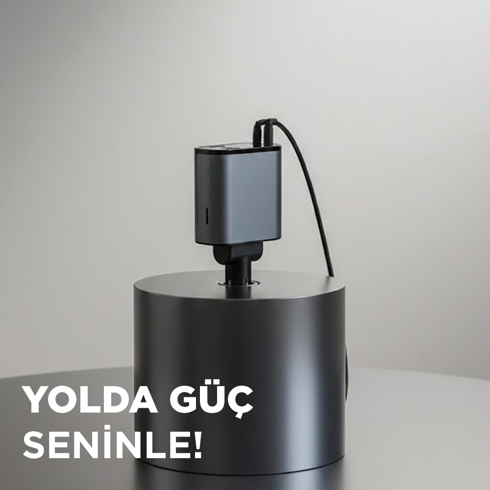 Silindirik tabanlı gri powerbank, kablolu.