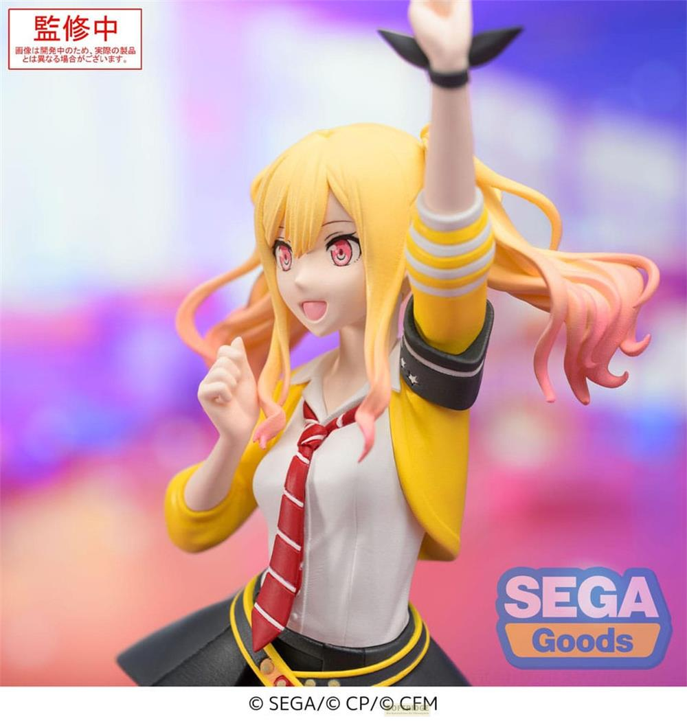 Eine Anime-Figur mit gelben Haaren, rotem Halstuch und gelber Jacke.